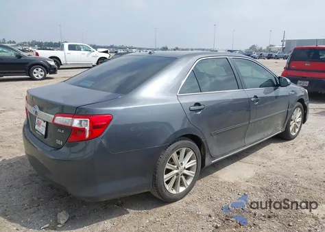2012 Toyota Camry Hybrid z USA, uszkodzony, nr VIN 4T1BD1FK1CU033027
